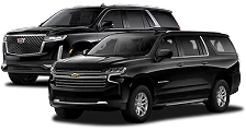 Two black luxury SUVs.